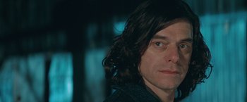 Movie still from “The Sweet Hereafter” (1997), directed by Atom Egoyan – A person with long brown hair; Close Up shot, Low angle