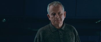 Movie still from “The Sweet Hereafter” (1997), directed by Atom Egoyan – An older man is looking at the camera; Close Up shot, Low angle
