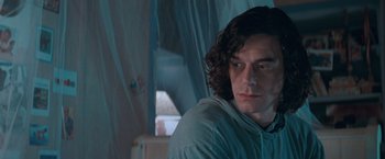 Movie still from “The Sweet Hereafter” (1997), directed by Atom Egoyan – A person sitting in a room; Close Up shot, Low angle