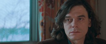 Movie still from “The Sweet Hereafter” (1997), directed by Atom Egoyan – A person with long hair; Close Up shot, Over the shoulder angle