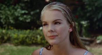 Movie still from “The Swimmer” (1968), directed by Sydney Pollack – A person wearing a blue and white shirt; Close Up shot, High angle
