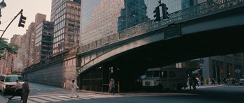 Movie still from “The Switch” (2010), directed by Josh Gordon – A couple of people standing under a bridge; Extreme Wide shot, High angle