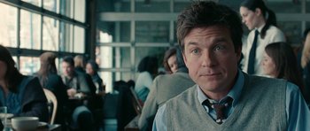 Movie still from “The Switch” (2010), directed by Josh Gordon – A person wearing a tie; Close Up shot, Over the shoulder angle