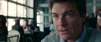 Movie still from “The Switch” (2010), directed by Josh Gordon – A man's face in a room; Close Up shot, Over the shoulder angle