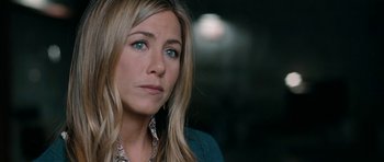 Movie still from “The Switch” (2010), directed by Josh Gordon – A person with blue eyes; Close Up shot, Over the shoulder angle