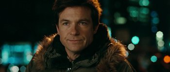 Movie still from “The Switch” (2010), directed by Josh Gordon – A person wearing a jacket; Close Up shot, Over the shoulder angle