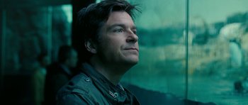 Movie still from “The Switch” (2010), directed by Josh Gordon – A person wearing a jacket; Close Up shot, Low angle