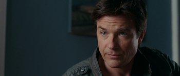 Movie still from “The Switch” (2010), directed by Josh Gordon – A person wearing a jacket; Close Up shot, Over the shoulder angle