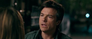 Movie still from “The Switch” (2010), directed by Josh Gordon – A person wearing a jacket; Close Up shot, Over the shoulder angle