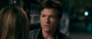 Movie still from “The Switch” (2010), directed by Josh Gordon – A person wearing a jacket; Close Up shot, Over the shoulder angle