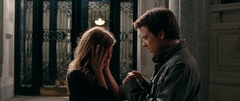 Movie still from “The Switch” (2010), directed by Josh Gordon – A man and a woman holding their hands in front of each other; Close Up shot, Over the shoulder angle