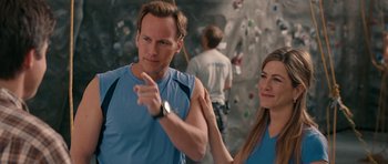 Movie still from “The Switch” (2010), directed by Josh Gordon – A man and a woman in front of a climbing wall; Close Up shot, Over the shoulder angle
