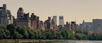 Movie still from “The Switch” (2010), directed by Josh Gordon – A view of a large city from across the river; Extreme Wide shot, Low angle