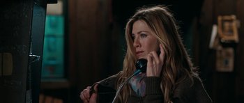 Movie still from “The Switch” (2010), directed by Josh Gordon – A woman holding a phone up to her ear; Close Up shot, High angle