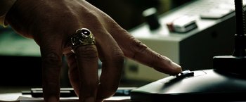Movie still from “The Taking of Pelham 123” (2009), directed by Tony Scott – A hand with a ring on it's finger; Extreme Close Up shot, High angle