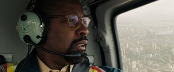 Movie still from “The Taking of Pelham 123” (2009), directed by Tony Scott – A person in a helicopter; Close Up shot, Low angle