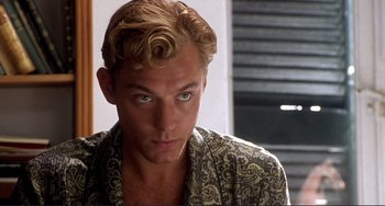 Movie still from “The Talented Mr. Ripley” (1999), directed by Anthony Minghella – A person wearing a robe; Close Up shot, Over the shoulder angle