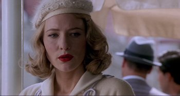 Movie still from “The Talented Mr. Ripley” (1999), directed by Anthony Minghella – A person wearing a hat; Close Up shot, Low angle