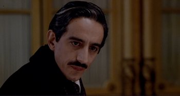 Movie still from “The Talented Mr. Ripley” (1999), directed by Anthony Minghella – A person with a mustache; Close Up shot, High angle