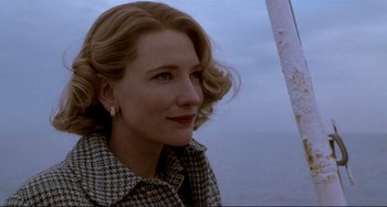 Movie still from “The Talented Mr. Ripley” (1999), directed by Anthony Minghella – A person wearing a jacket; Close Up shot, Low angle