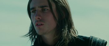 Movie still from “The Tempest” (2010), directed by Julie Taymor – A person with long hair; Close Up shot, Low angle