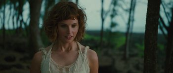 Movie still from “The Tempest” (2010), directed by Julie Taymor – A person wearing a white shirt; Close Up shot, Over the shoulder angle