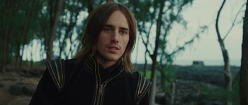Movie still from “The Tempest” (2010), directed by Julie Taymor – A person with long brown hair; Close Up shot, Low angle