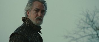 Movie still from “The Tempest” (2010), directed by Julie Taymor – A person with a beard; Close Up shot, Low angle