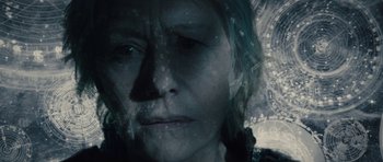 Movie still from “The Tempest” (2010), directed by Julie Taymor – A woman's face in a double exposure; Extreme Close Up shot, Overhead angle