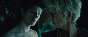 Movie still from “The Tempest” (2010), directed by Julie Taymor – A man and a woman looking at one another; Close Up shot, Over the shoulder angle