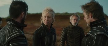 Movie still from “The Tempest” (2010), directed by Julie Taymor – A woman and a man standing next to each other in the desert; Medium shot, Over the shoulder angle