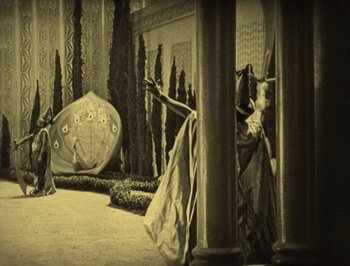 Movie still from “The Thief of Bagdad” (1924), directed by Raoul Walsh – A black - and - white photo of a stage set; Extreme Wide shot, High angle