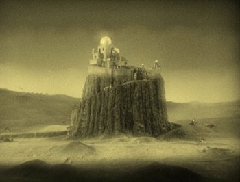 Movie still from “The Thief of Bagdad” (1924), directed by Raoul Walsh – An image of a castle on top of a hill; Extreme Wide shot, High angle
