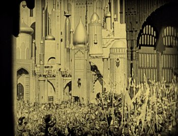 Movie still from “The Thief of Bagdad” (1924), directed by Raoul Walsh – A black and white photo of a medieval castle; Extreme Wide shot, High angle