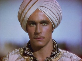 Movie still from “The Thief of Bagdad” (1940), directed by Alexander Korda – A person wearing a turban; Close Up shot, Low angle