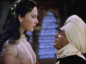 Movie still from “The Thief of Bagdad” (1940), directed by Alexander Korda – A man and a woman looking at one another; Close Up shot, Low angle