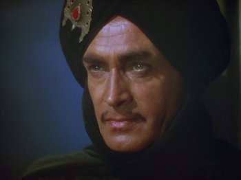 Movie still from “The Thief of Bagdad” (1940), directed by Alexander Korda – A person wearing a turban; Close Up shot, Low angle