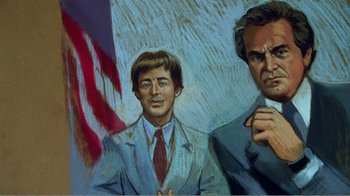 Movie still from “The Thin Blue Line” (1988), directed by Errol Morris – A painting of a man in a suit and tie next to an american flag; Medium shot, Low angle