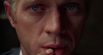 Movie still from “The Thomas Crown Affair” (1968), directed by Norman Jewison – A man with blue eyes; Extreme Close Up shot, Overhead angle