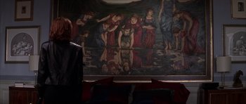 Movie still from “The Thomas Crown Affair” (1999), directed by John McTiernan – A painting of a group of people standing around a body of water; Wide shot, Overhead angle