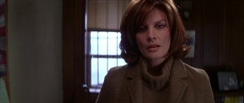 Movie still from “The Thomas Crown Affair” (1999), directed by John McTiernan – A person wearing a jacket; Close Up shot, Low angle