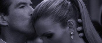 Movie still from “The Thomas Crown Affair” (1999), directed by John McTiernan – The face of a beautiful woman; Extreme Close Up shot, Low angle