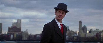 Movie still from “The Thomas Crown Affair” (1999), directed by John McTiernan – A man wearing a suit and a hat; Close Up shot, Low angle