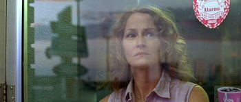 Movie still from “The Three Burials of Melquiades Estrada” (2005), directed by Tommy Lee Jones – A person looking out of a window; Close Up shot, Low angle