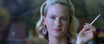 Movie still from “The Three Burials of Melquiades Estrada” (2005), directed by Tommy Lee Jones – A person wearing a head band; Close Up shot, Over the shoulder angle