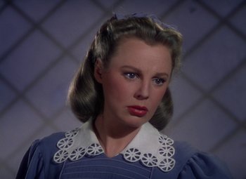 Movie still from “The Three Musketeers” (1948), directed by George Sidney – A person wearing a dress; Close Up shot, Low angle