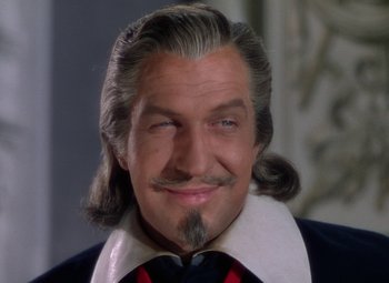 Movie still from “The Three Musketeers” (1948), directed by George Sidney – A person wearing a suit and tie; Close Up shot, Low angle