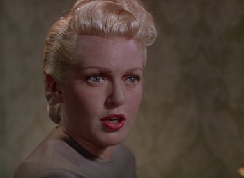 Movie still from “The Three Musketeers” (1948), directed by George Sidney – A person with blonde hair; Close Up shot, Low angle