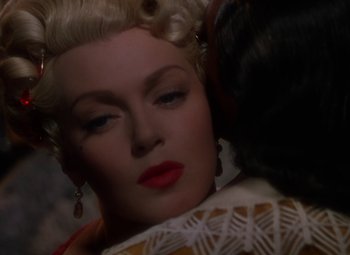 Movie still from “The Three Musketeers” (1948), directed by George Sidney – A woman's face in a white dress; Close Up shot, Over the shoulder angle