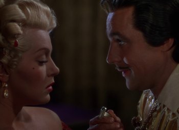 Movie still from “The Three Musketeers” (1948), directed by George Sidney – A man and a woman looking at one another; Close Up shot, Over the shoulder angle